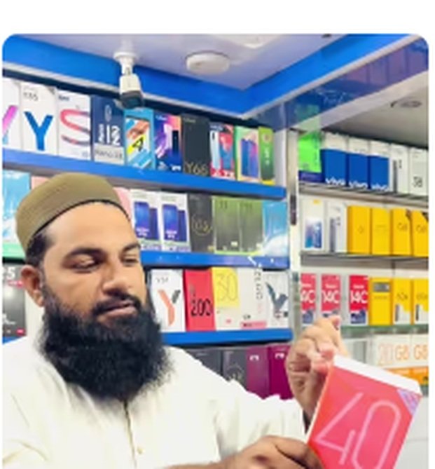 Rashid Mobile Zone owner at the shop